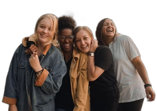 A diverse group of four women laughing together